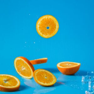 Photo of oranges on a light blue background